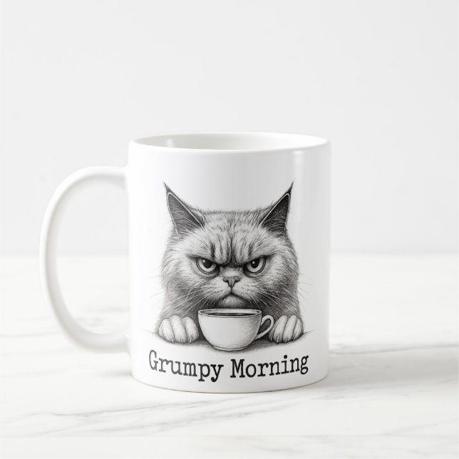 Kaffe kopp med sur katt på morgonen (Vänster)