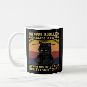 Kaffe med bakomliggande spaltning är katter med al kaffemugg