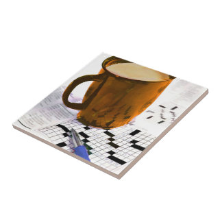 Kaffe och ett korsordpussel kakelplatta
