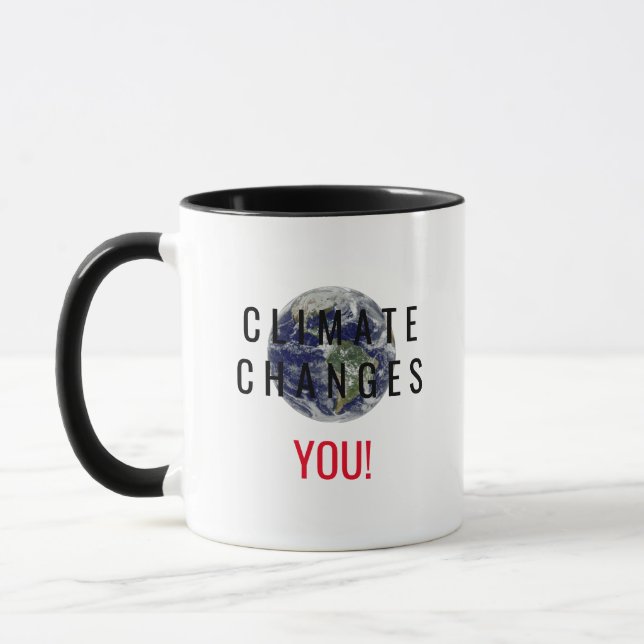 Kaffemugge med meddelande om ökad medvetenhet om k mugg (Vänster)