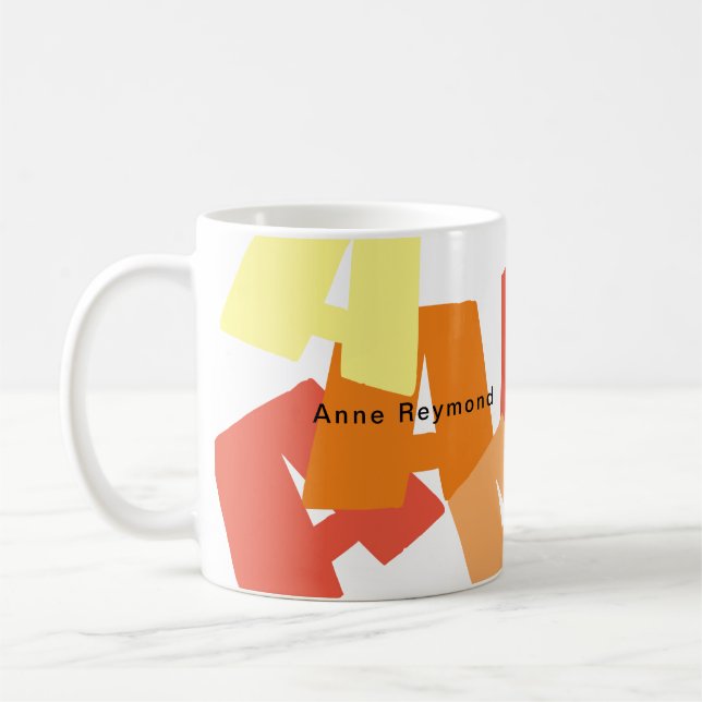 Kaffemugge med stora färgbokstäver kaffemugg (Vänster)