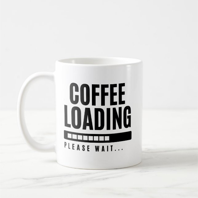 Kaffet laddar vänligen vänta kaffemugg (Vänster)