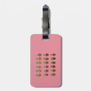 Kaktus på rosa bagagemärkre bagagebricka