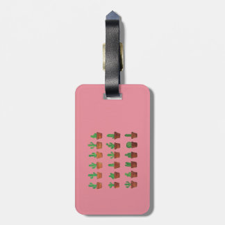 Kaktus på rosa bagagemärkre bagagebricka