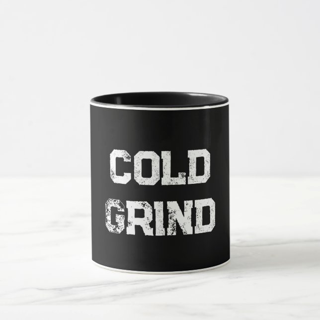 ’Kall Grind’ Mugg (Center)