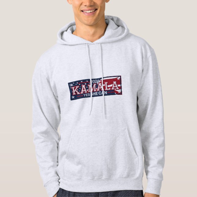KAMALA HARRIS "JES SHE CAN" Manar Hoodie (Framsida)