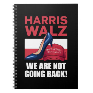 Kamala Harris klackar trampar på röd MAGA-hatt Anteckningsbok