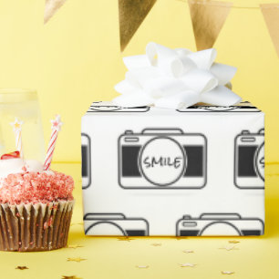 Kamera med miljetext presentpapper