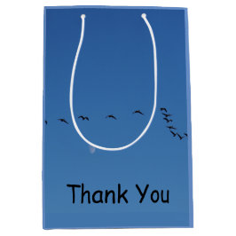 Kanadensiska gäss under flygning