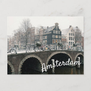 Kanal i Amsterdam på vintern vykort