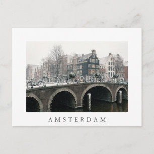 Kanal i Amsterdam på vintern Vykort