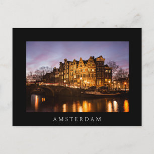 Kanalhus i Amsterdam vid mörkrets svarta vykort