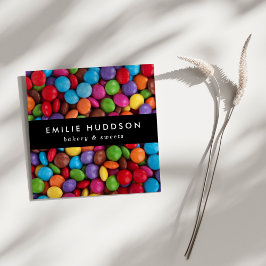 Kandiseknappar, sötsaker, kummelbutiker, bakverk fyrkantigt visitkort