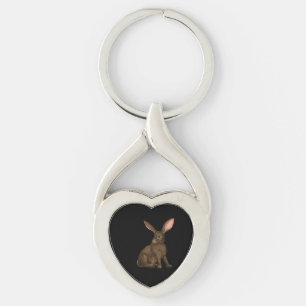 Kanin 4 twisted heart silverfärgad nyckelring