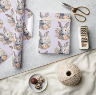 Kanin omgiven av pastellfärgade blommor Sött mönst Presentpapper