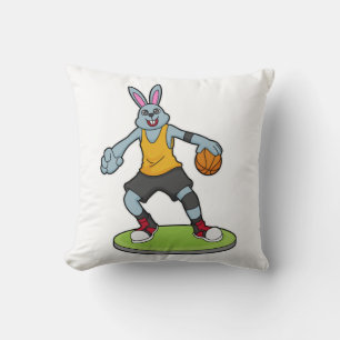 Kanin som basketspelare med basket kudde