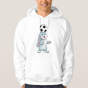 Kanin som fotbollsspelare med fotboll hoodie