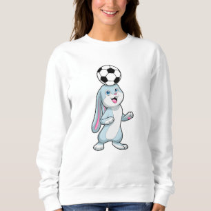 Kanin som fotbollsspelare med fotboll t shirt