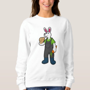 Kanin som jordbrukare med morot och hat t shirt