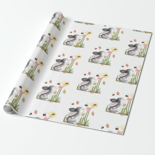 Kanin som slår in papper presentpapper