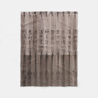 Kanji-text ombord fleecefilt
