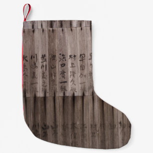 Kanji-text ombord liten julstrumpa