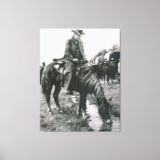 Kanvastrycket Watering Hål Cowboyen på häst Canvastryck (Framsida)