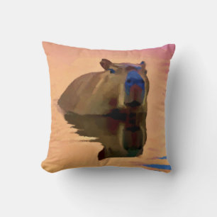 Kapybara som kommer från en tranquil Sjö Kudde