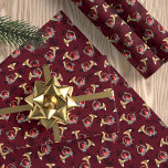 Kardinaler i Guld vid Burgundy vid julhorn Presentpapper<br><div class="desc">Röda kardinaler tränger in i julklangarna i guld,  som är dekorerade med en mängd grönska,  gräs-koner och festliga löv och bär. Bakgrunden till detta papper är en mörk rött färg.</div>
