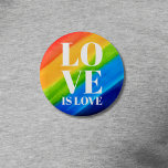 Kärlek är Kärlek Pride Rainbow Knapp<br><div class="desc">Det här Pridet Button är dekorerat med KÄRLEK IS KÄRLEK i fetstil,  vitt brev på en vattenfärgsbakgrund med rött,  orange,  gult,  grönt,  blått och lila. Ursprunglig vattenfärg © Michele Davies.</div>