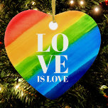 Kärlek är Kärlek Rainbow Gay pride Heart Julgransprydnad Keramik<br><div class="desc">Kärlek är kärlek. Grattis till kärlek,  jämlikhet och Pridet i juni månad. Pridet Ornament är hjärtformat och dekorerat med regnbåge rand och snyggt vit typografi på en vattenfärgad regnbågsbakgrund med rött,  orange,  gult,  grönt,  blått och lila. Ursprunglig vattenfärg © Michele Davies.</div>