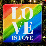 Kärlek är Kärlek Rainbow Gay pride Julgransprydnad Keramik<br><div class="desc">Kärlek är kärlek. Grattis till kärlek,  jämlikhet och Pridet i juni månad. Pridet Ornament dekoreras med regnbåge rand och snyggt vit typografi på en vattenfärgad regnbågsbakgrund med rött,  orange,  gult,  grönt,  blått och lila. Ursprunglig vattenfärg © Michele Davies.</div>