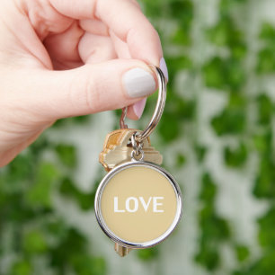 Kärlek - beige, kamel, vit minimalistisk nyckelked rund silverfärgad nyckelring