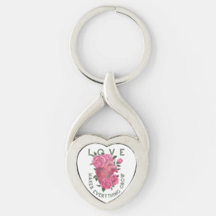 Kärlek får allt att växa twisted heart silverfärgad nyckelring