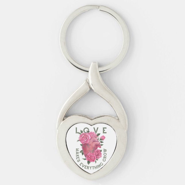 Kärlek får allt att växa twisted heart silverfärgad nyckelring (Framsidan)