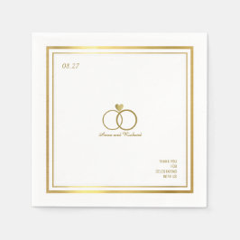 kärlek hjärta och två bröllop ringar, en elegant pappersservett