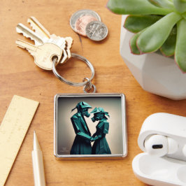 KÄRLEK OCH RESISTANS Origami 2 Premium Metall Fyrkantig Silverfärgad Nyckelring