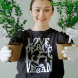 Kärlek Peace Vegan Slogan Vegetarian Funny T Shirt<br><div class="desc">Denna design är avsedd för växtdrivna veganer och vegetarianer som vet att djur är vänner, inte mat. Den här utformningen av Peace Kärlek Vegan finns också på olika produkter, inklusive klistermärken, mugg, t-shirts, telefonfodral, se nedan! Om du vill köpa den här designen väljer du din favoritprodukt och klickar på Lägg...</div>