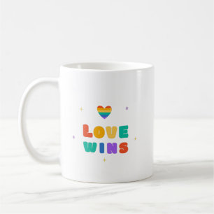 Kärlek vinner med regnbåge kaffemugg