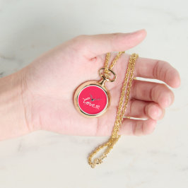 Kärlek, vit text om rosa armbandsur