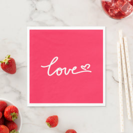 Kärlek, vit text om rosa pappersservett