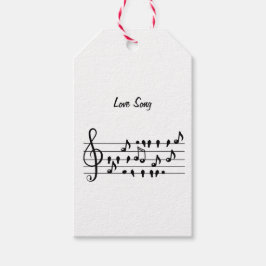 Kärlekssång, fåglar sittande mellan noterna presentetikett