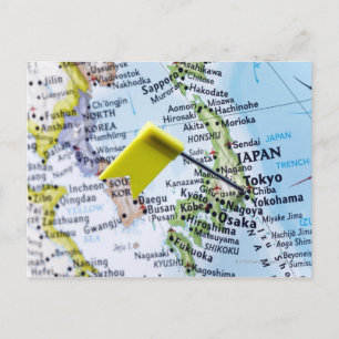 Karta-stift placerad i Tokyo, Japan på karta, nära Vykort