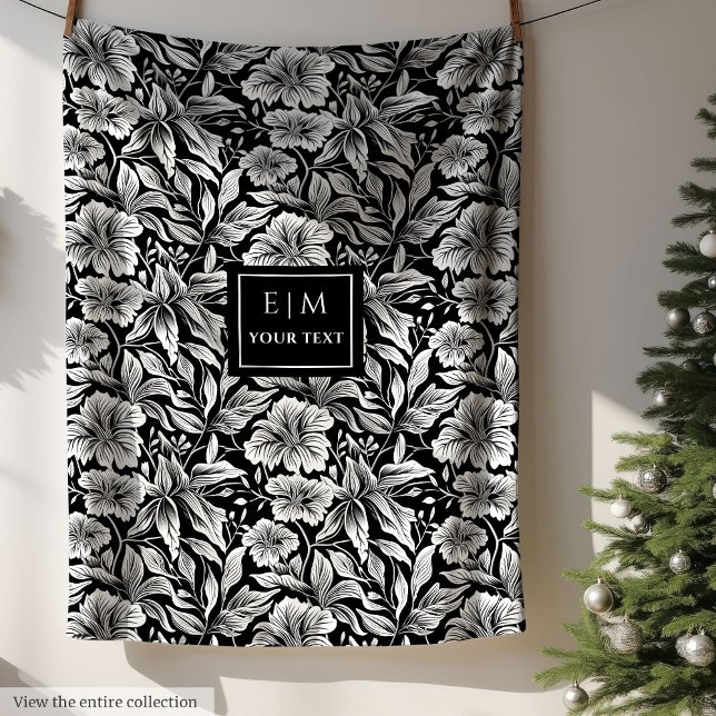 Kartläggning av svart- och vitblommor ull fleecefilt (Charming black and white flowers fleece wrap)