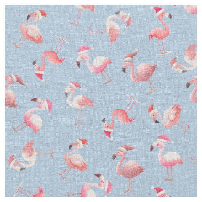 Kastade julflamingos på ljusblått tyg (Närbild)