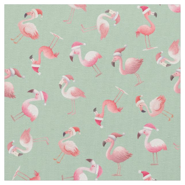 Kastade julflamingos på ljust grönt tyg (Närbild)