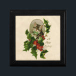 Kat jul Merry Holly Kitten Antique Art Minnesask<br><div class="desc">En mycket god jul i kattunge! Den här söta lilla katten kommer från 1800-talet och tittar ut genom en spray av julklapp i löv.</div>