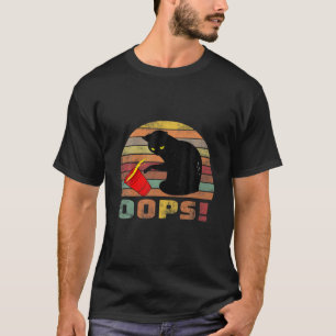 Kat Oops! Lustigt svart katt som knackar över ett  T Shirt