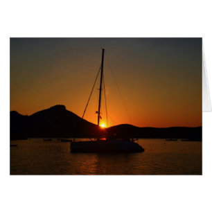 Katamaran vid sunset Ibiza. Hälsningskort