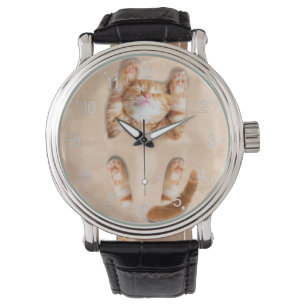 Katt begravd i sand armbandsur